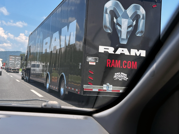 semi with Monster Truck inside