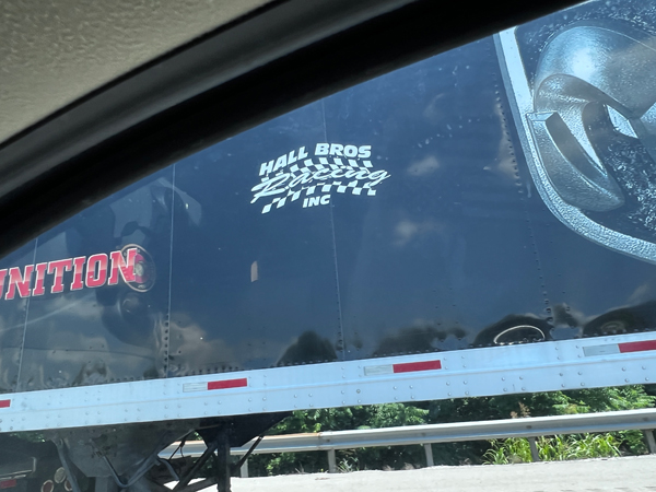 semi with Monster Truck inside