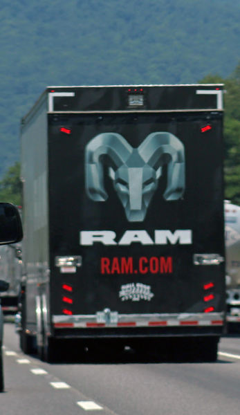 semi with Monster Truck inside