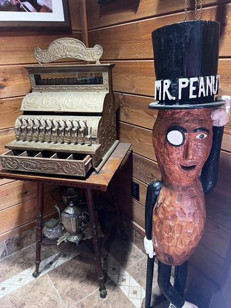 Mr Peanut and an old cash register