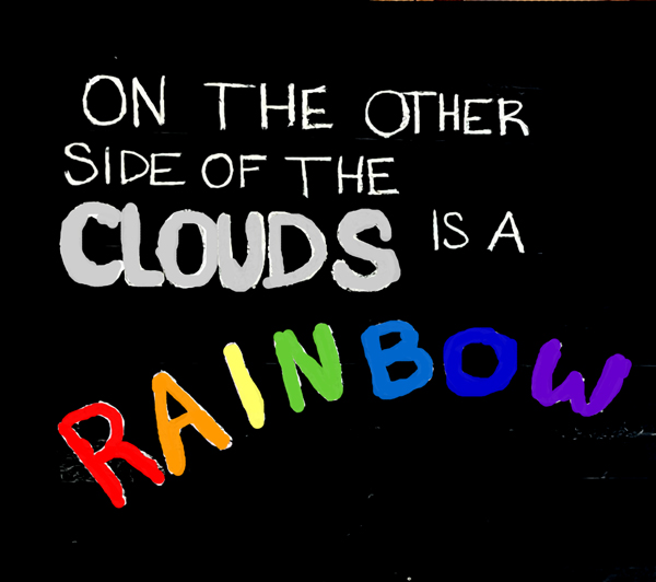Clouds and rainbow sign