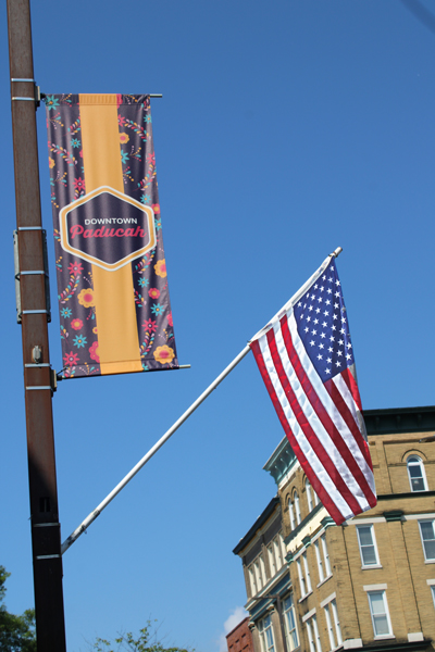 Paducah sign and USA flag