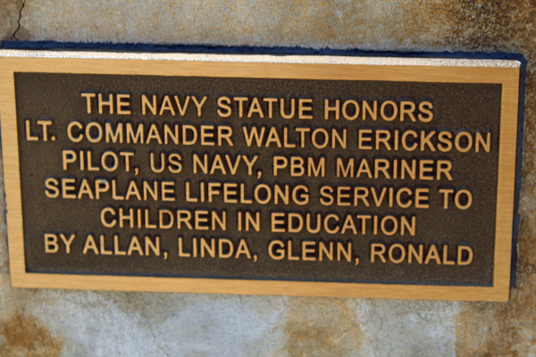 The U.S. Navy Statue sign