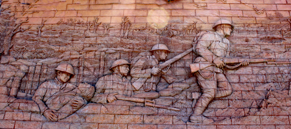 The top photo on the left side of the memorial