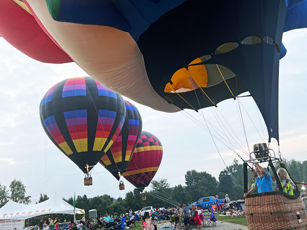three hot air balloons