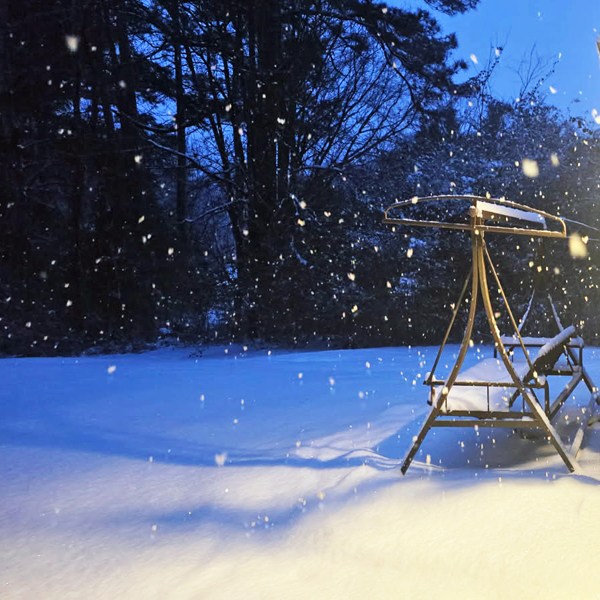 swing bench and snow