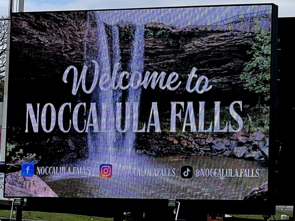 welcome to Noccalulua falls sign