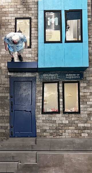 Lee Duquette walking on the building