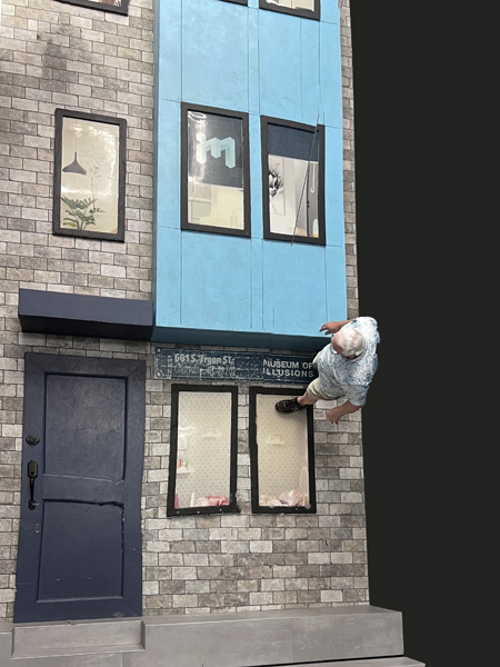 Lee Duquette walking on the building