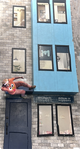 Karen Duquette walking on the building