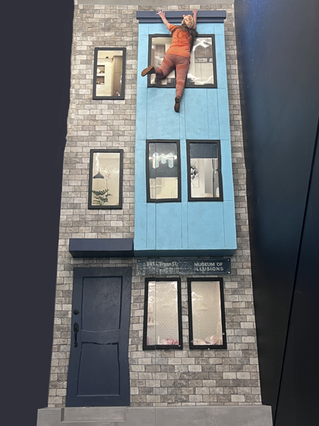 Karen Duquette walking on the building