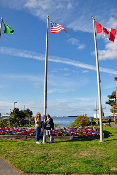 Karen, Ilse, flags, and flowers