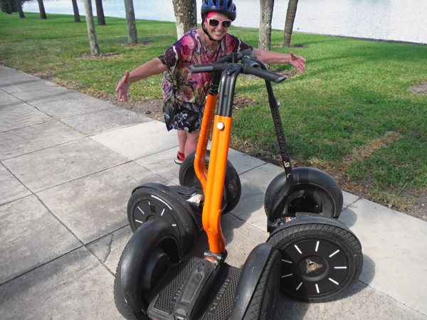Karen Duquette giving the Segways some love.