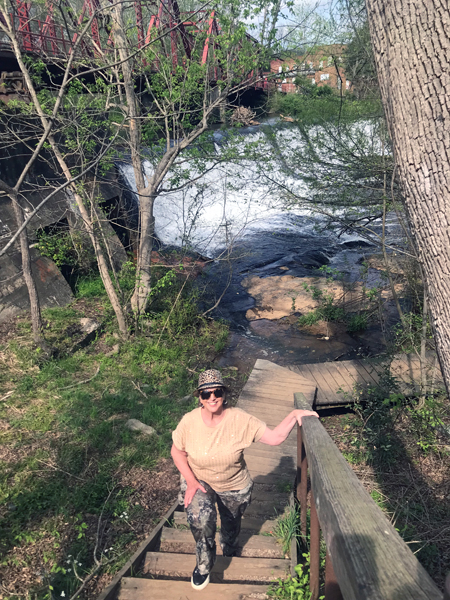 Karen Duquette on the stiarcase