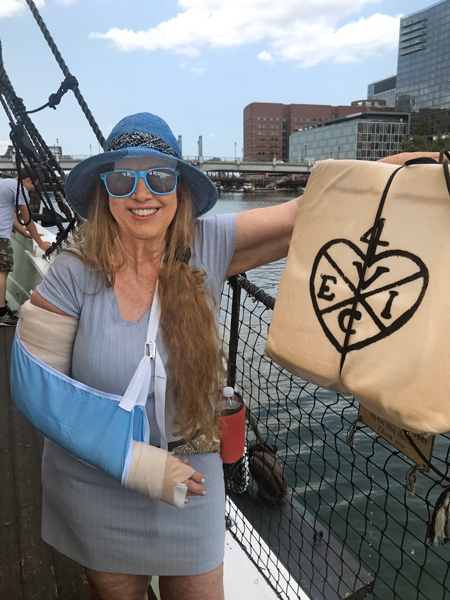 Karen Duquette throwing tea overboard