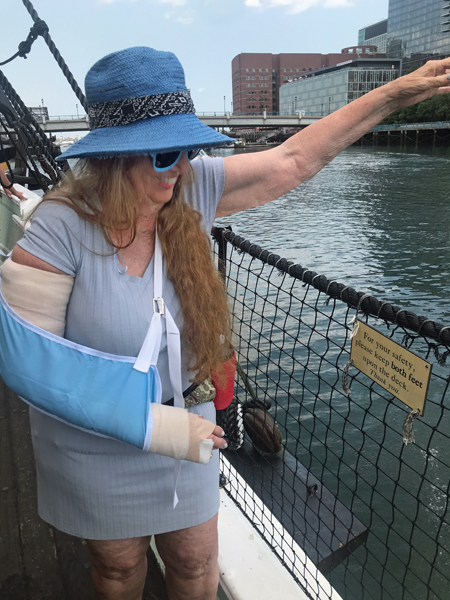 Karen Duquette throwing tea overboard