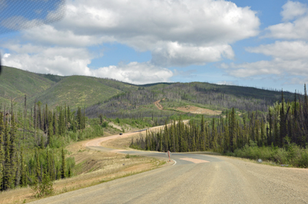 a windy gravel road extending for miles