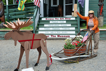 Karen Duquette mushing a moose sled